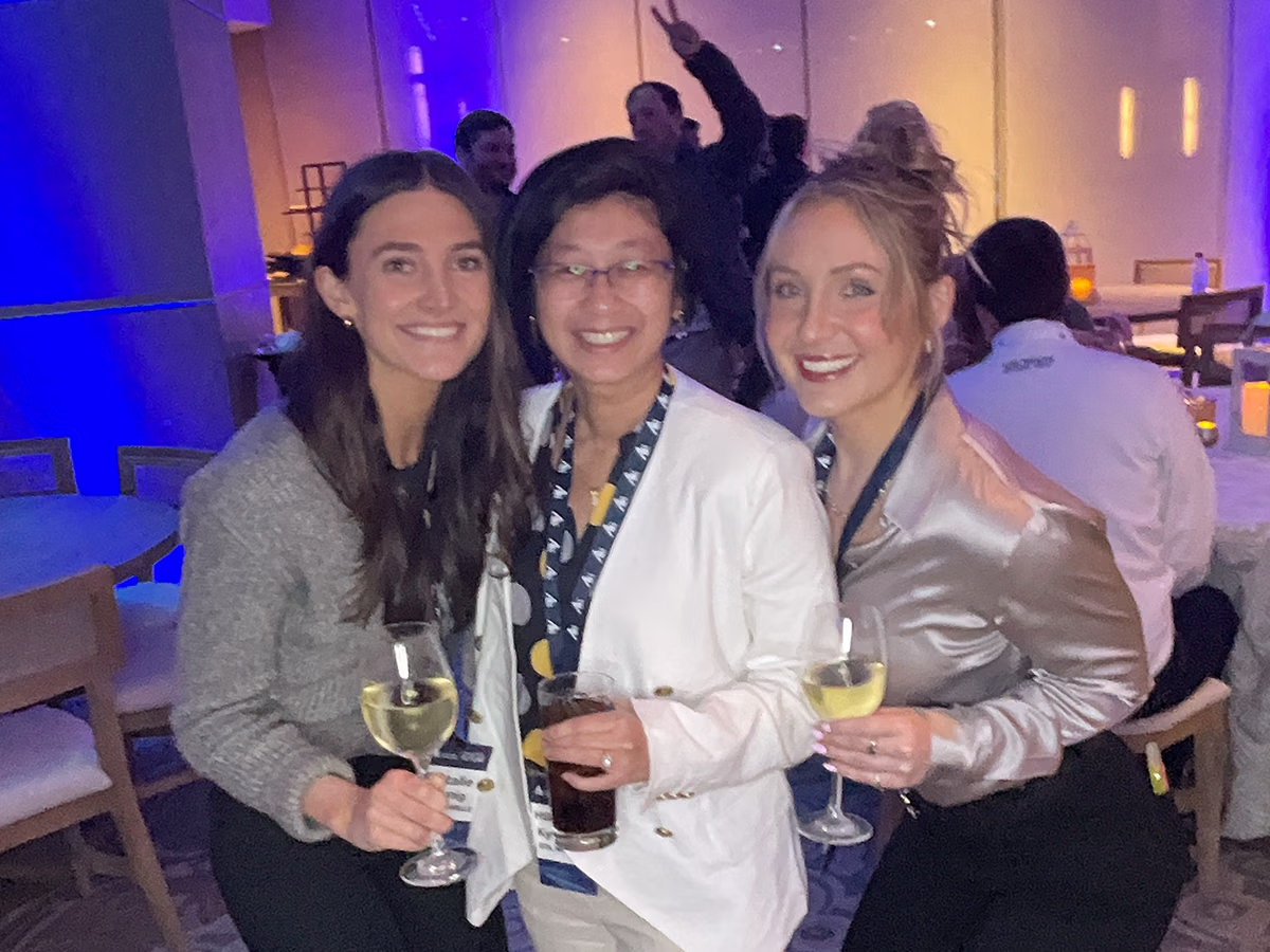 Roaming Magic Photo Booth Rentals capturing a group of attendees at a corporate event in Southwest Florida | Photo Magic Events